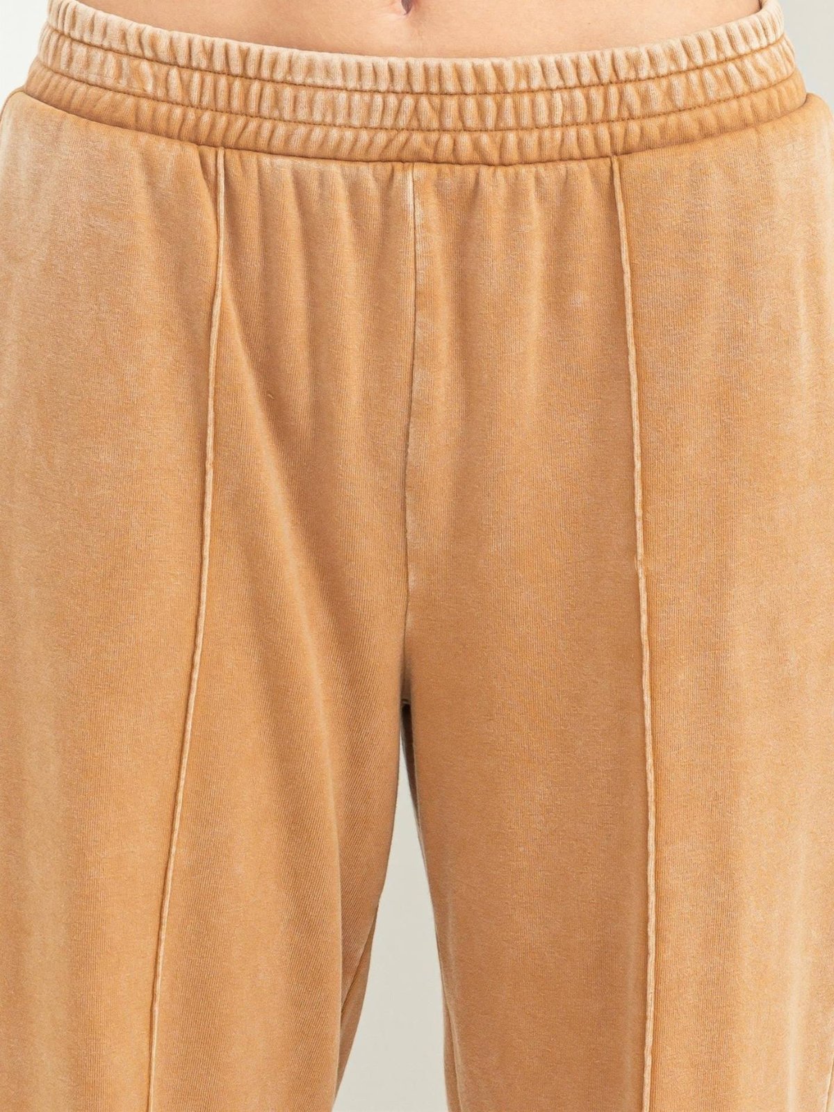 **Alt Text:**  
Close-up of Chill Vibes Pintuck Sweatpants in a straight-leg cut, featuring pintuck detailing, an elastic waistband, and side slit pockets, perfect for a comfortable yet stylish look.